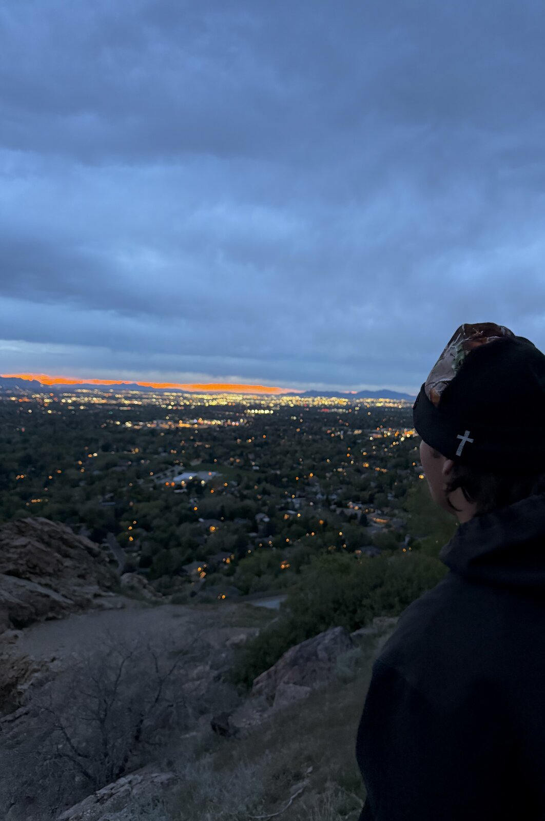 Topstitch beanie at sunrise overlooking the city